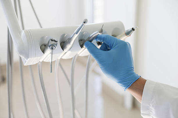 Professional Root Canal Treatment technician working in Opelika, AL